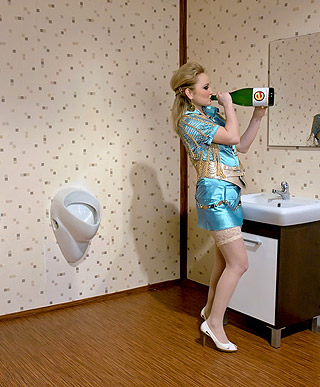  Slimy blonde slut masturbating with a bottle and fake cock