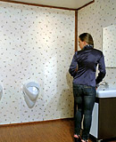 Hottie sucking on big rubber cock gets covered in slime