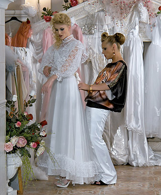 Sexy clothed lesbians enjoy shagging each other in the pool