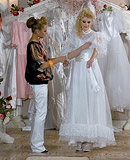 Sexy clothed lesbians enjoy shagging each other in the pool