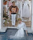 Sexy clothed lesbians enjoy shagging each other in the pool