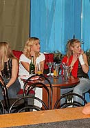 Hot blonde babe sucking cock and fucking in a strip club