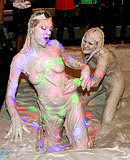 Horny and lesbian beauties love bathing in the mud pool