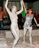 Horny and lesbian beauties love bathing in the mud pool