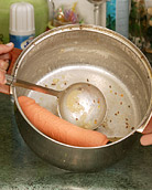 Horny teenagers in their kitchen massaging damp pussies