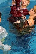 Three wet lesbians playing with each other in the deep end