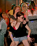 Stunning hotties show their boobs and suck a big stiff cock