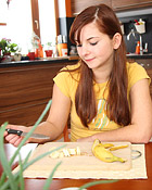  Angelic brunette shagging a chap under the kitchen table
