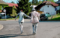 Two very sexy chicks love playing with a lot of white paint