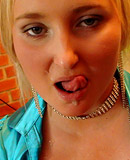 A gorgeous hottie playing with a stiff prick in her mouth