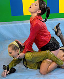 Two cute lesbian chicks enjoy playing with slippery goo