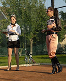 Sporty sweethearts enjoy playing with wet bottled water