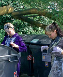 Hot fetish chicks playing with the dirty trash outdoors