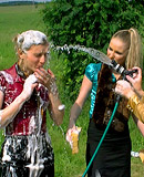 Two cute car washing lesbian hotties love getting dirty