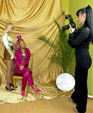 Three pretty horny babes covered in cream enjoy fondling