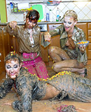 Three pretty horny babes covered in cream enjoy fondling