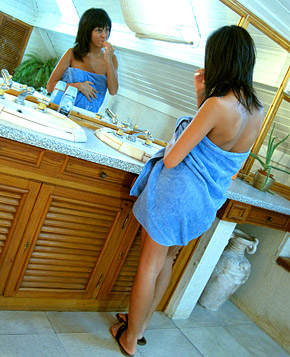 A weird teen hottie brushing her vagina with toothbrush