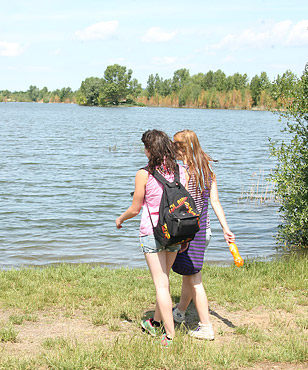 Two lesbian hotties enjoy rubbing each others damp cunt