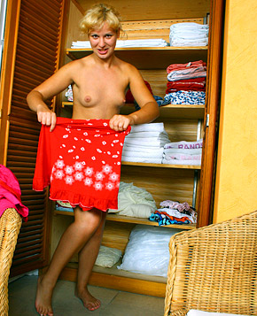  A gorgeous teenage blonde sweetheart plays with herself