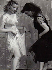 Cute and sexy vintage lesbians undressing in the fifties