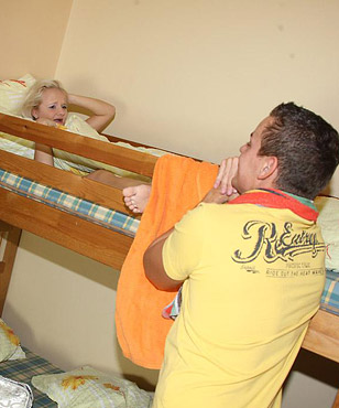 A teenager fucked in her own bed by a horny fellow hard