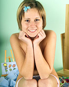 Gorgeous teenage chick rubbing her young titties and cunt