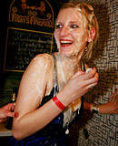 Hotties playing with white cream on their pretty titties