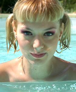 Tia, pigtails girl toying and being fist-fucking around the swiming pool