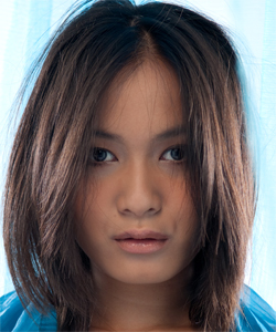 Terrific asian Angel called Yoko stripping in blue studio...