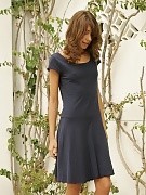 Limber brunette cutie shyly undresses and poses outside