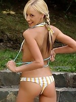 Coquettish blonde strips and dildos bald quim in garden