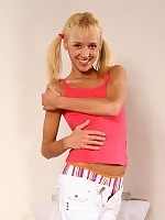  Adorable blonde gets naked and spreads her sweet pink pussy