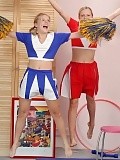 Delightful cheerleaders get naked and taste sweet pussies
