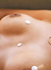 Kayla Synz
 Captivating blonde anilos kayla synz rubs lotion into her massive breasts