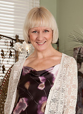 Hot Anilos granny wears stockings as she shows off her naked body