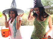Alexis Breeze - Two trick or treating sluts get a nasty cum surprise.