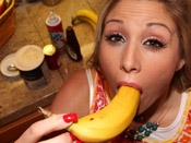 Malia Kelly - Slutty bitch fucks her mouth with a banana!