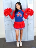 Flirtatious horny cheerleader pulls up her red skirt and bares her alluring tight teen hole