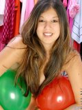 Long haired fresh teen posing just with balloons around her