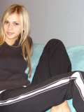  Seriously cute teen lounges in her jogging pants just looking fine as hell