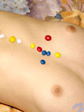 Sweet teen katrina showering her petite body with candies