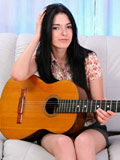 Larisa decides playing with her pussy is more important than guitar lessons
