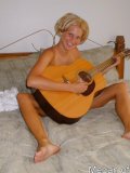 Hot teen gets off playing guitar in the nude
