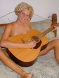 Hot teen gets off playing guitar in the nude