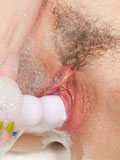 Proxy Paige gets sudsy and wet as she masturbates with her toy in the tub
