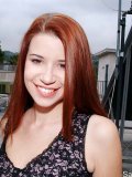 Pretty teen with long red hair has some really erect nipples