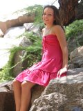 Cutie in the trees has on a sexy red dress she shows some upskirt shots and her small boobs
