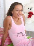 Tiny boobies teen tresseme sits in pink and shows all shes got off to the camera
