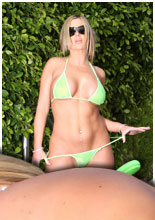 Blonde babe in see thru bikini