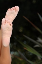 Sexy busty blonde, Eden Adams, is all dolled up in her Aziani gear. Tight white tank with her big tits squeezed inside and her cute little panties.